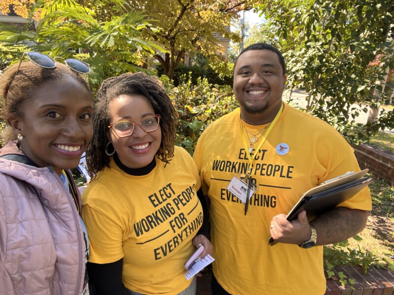 Three black organizers, carrying clipboards. Photo: Down Home North Carolina